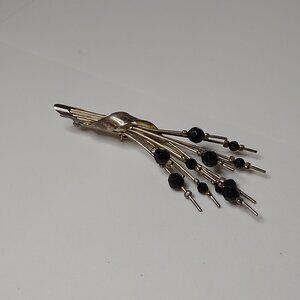 Silver Tone Brooch With Black Beads